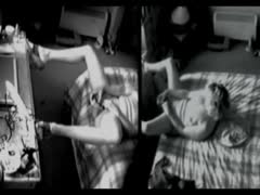 A slender wife was seen spreading her legs while masturbating on a covert camera.